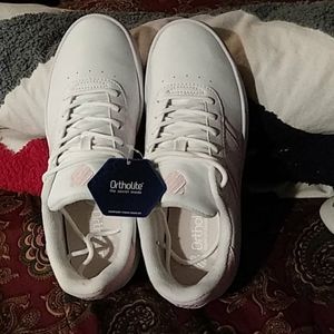 K Swiss. Orthopedic tennis shoes